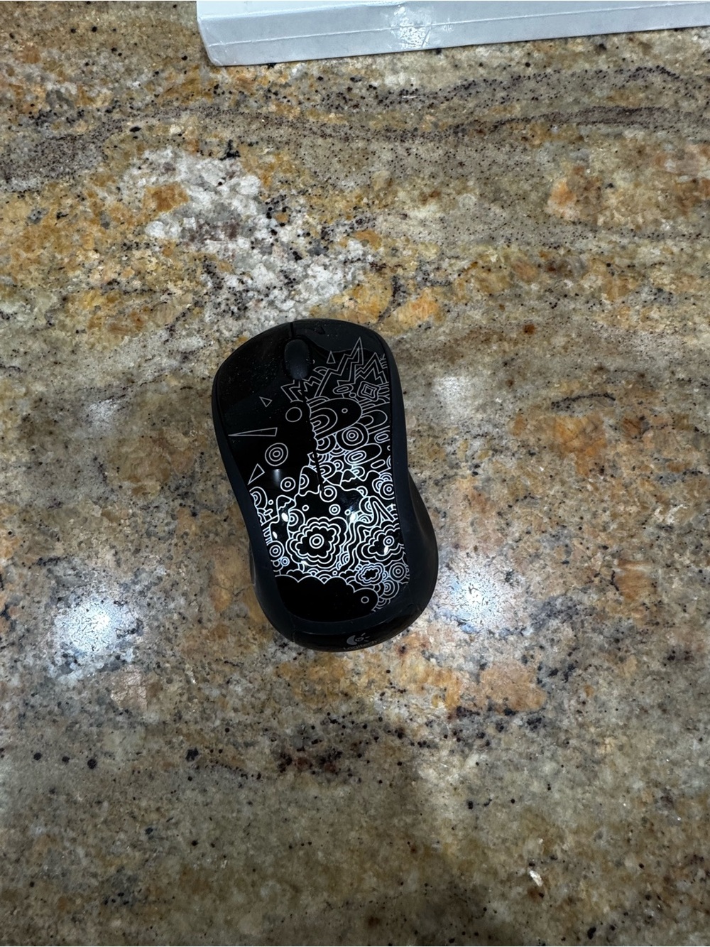 Logitech Black Wireless Mouse with White Doodle Design